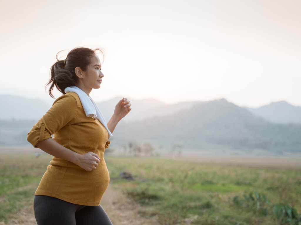 pregnant woman running